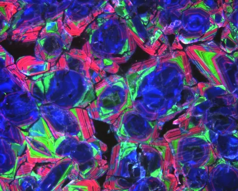 CL image of jadeitite colored blue, green, and pink